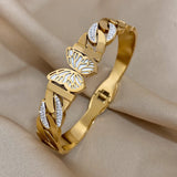 Bracelet papillon doré avec strass pour femmes.