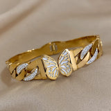 Bracelet papillon doré avec strass pour femmes.