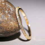 Bague Huitan – anneau mince minimaliste en zircon cubique, élégant pour femmes.