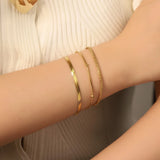 Set mit 12 Edelstahlarmbändern in Silber & Gold, wasserdicht, verschiedene Stile.