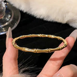 Bracelet Bangle Femme en Acier Titane Plaqué Or avec Zircon 𝓑2𝓢