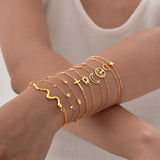 Bracelet minimaliste femmes, croix, lune et étoile, réglable.