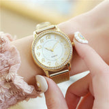 Montre femme de luxe en maille or rose avec cristaux incrustés – design moderne et élégant 𝓑2𝓢