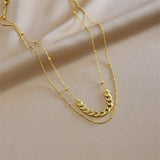 Collier MEYRROYU – pendentif rond en zircon, acier inoxydable 316L plaqué or 18K.
