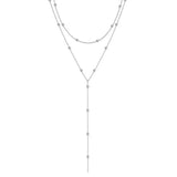Doppellagige Goldkette für Damen mit langen Anhängern und geometrischen Perlen – schlichter und trendiger Stil.