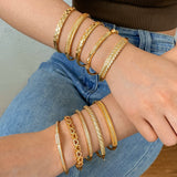 Bracelet chic en cuivre avec zircon, couleur or, design tendance pour femmes.