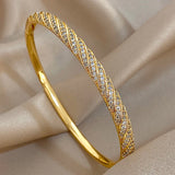 Bracelet chic en cuivre avec zircon, couleur or, design tendance pour femmes.