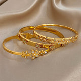 Bracelet en acier inoxydable unisexe – strass brillants, breloques fleurs, manchette étanche, cadeau élégant 𝓑2𝓢