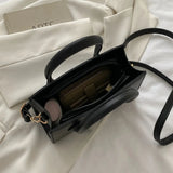 Sac bandoulière femme en cuir PU – grande capacité, style luxe décontracté.