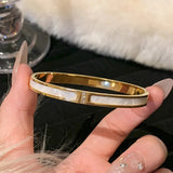 Bracelet Bangle Femme en Acier Titane Plaqué Or avec Zircon 𝓑2𝓢