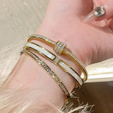 Bracelet Bangle Femme en Acier Titane Plaqué Or avec Zircon 𝓑2𝓢